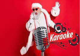 picture of santa singing karaoke