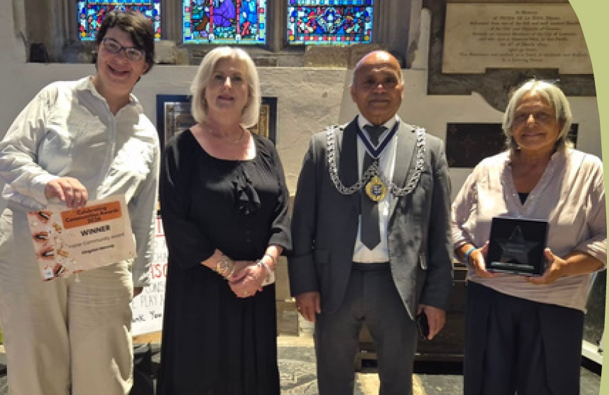 Photo showing the mayor and Kingston Mencap representatives with a certificate.