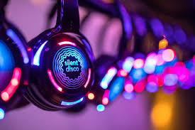 picture of headphone with words silent disco on them